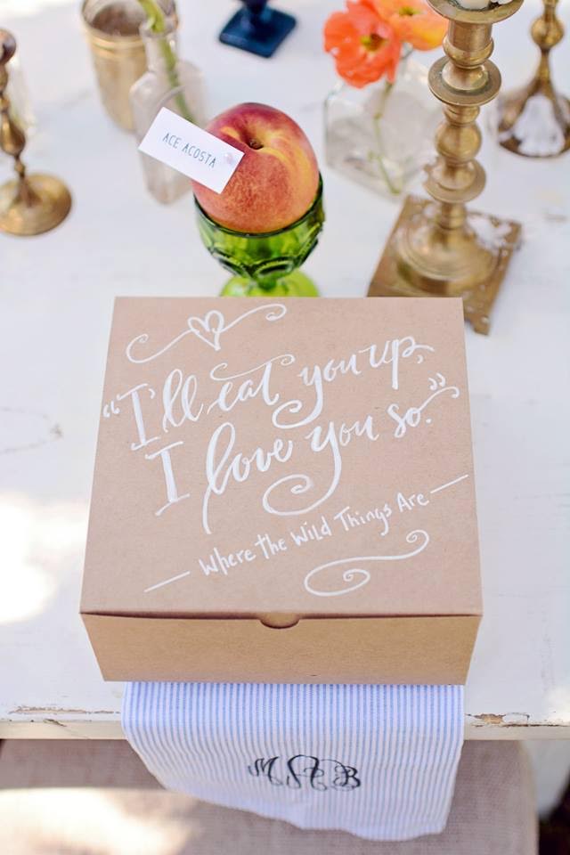 "I'll Eat You Up. I love you so." A sweet message written in script decorates the lids of individual craft paper food boxes.